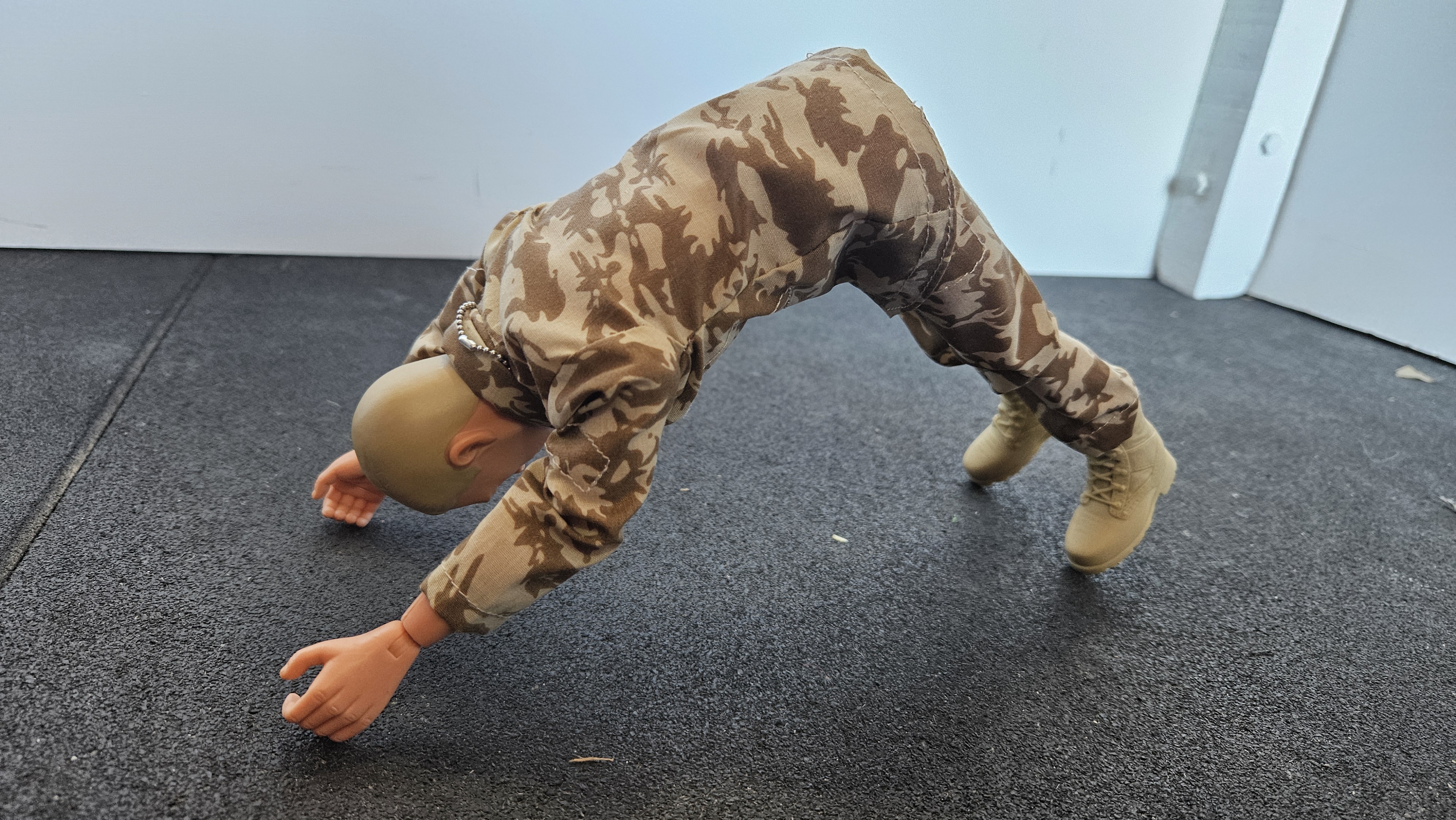 Action Man doing Downward Dog Pose